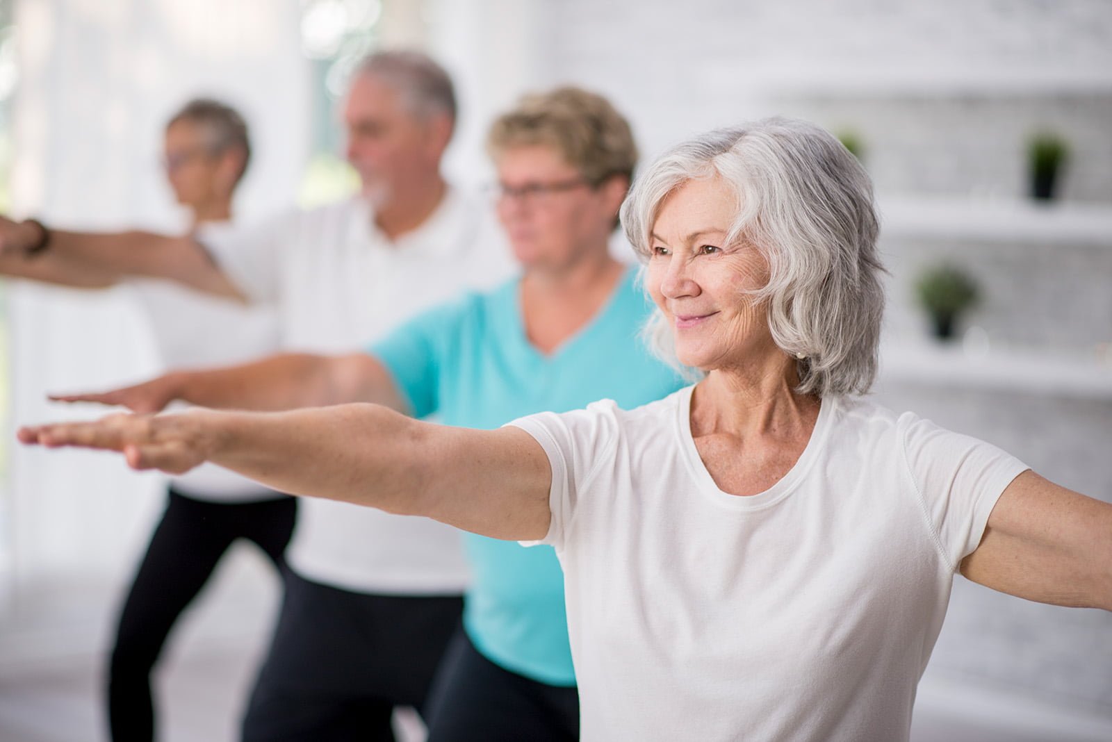 Group of elders doing yoga